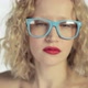 Young woman looking over glasses - VideoHive Item for Sale
