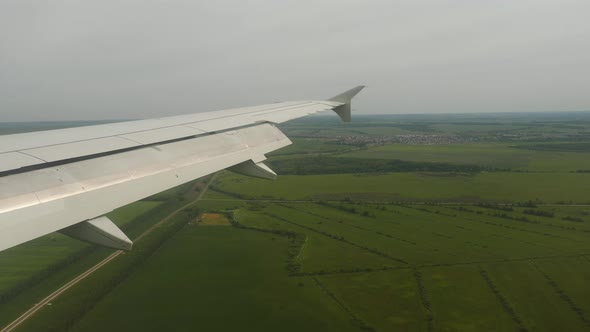 View From the Airplane Window To Forests and Fields