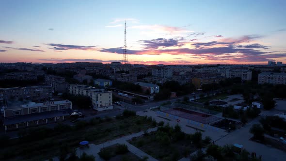 Pink Sunset Over a Small Town