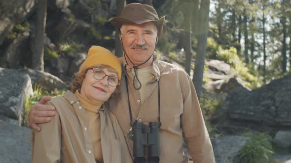 Portrait of Cheerful Elderly Couple in Nature