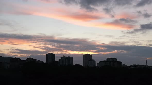 Evening Clouds And Buildings