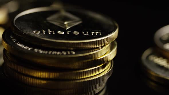 Rotating shot of Bitcoins (digital cryptocurrency) - BITCOIN ETHEREUM 190