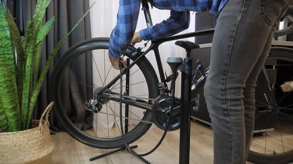 Pumping up bicycle wheel