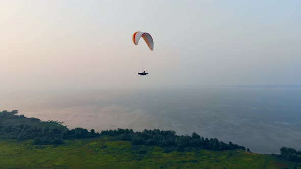 Paragliding Vehicle Is Flying Across the Sky