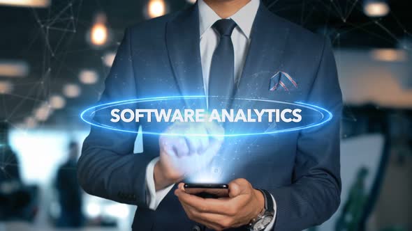 Businessman Smartphone Hologram Word   Software Analytics