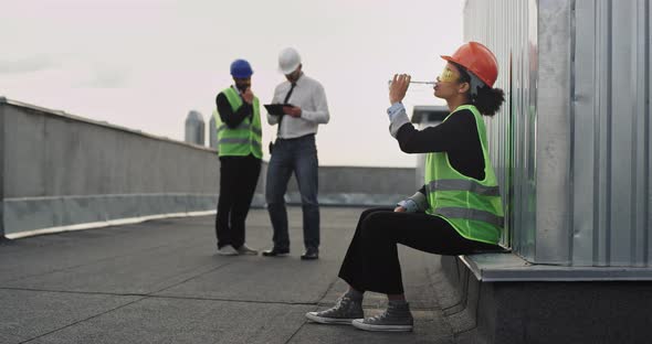 On the Rooftop of Construction Site Charismatic