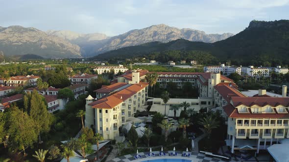 Panoramic View of Resort Hotel with Mountains in the Background