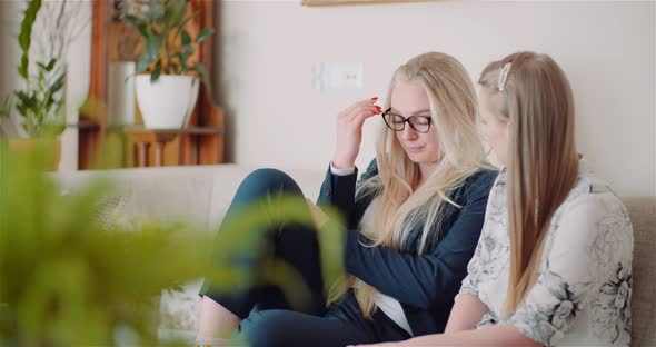 Businesswoman Consoling Colleague In Office