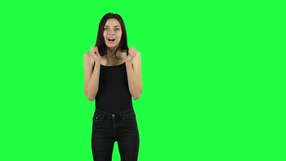 Young Surprised Girl with Shocked Wow Face Expression. Green Screen