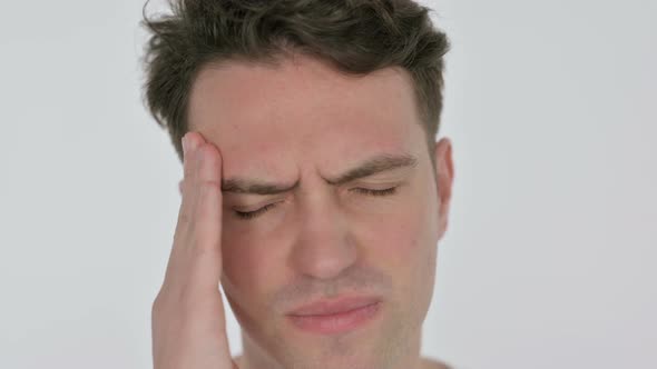 Face Close Up of Young Man with Headache