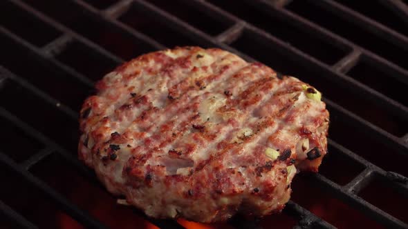 Closeup of the Meat Burger Cutlet with Onions Grilling Above the Open Fire / Videohive
