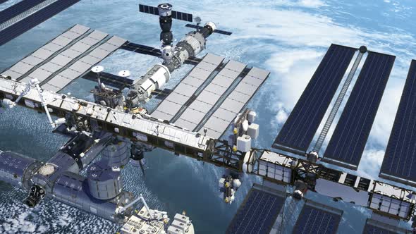 Flight Of The International Space Station Above The Large Hurricane alt