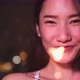 Young asian woman with sparklers is dancing and celebrating a new year. Fireworks, - VideoHive Item for Sale