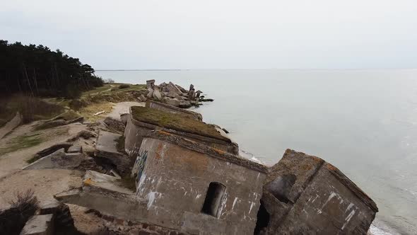 Aerial view of abandoned seaside fortification building at Karosta Northern Forts on the beach of Ba