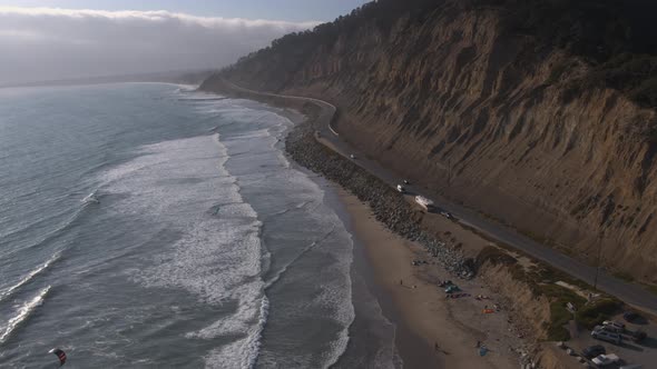 Aerial Drone Shot of a Road Lining a Scenic Coastline (Pacific Coast Highway, California)