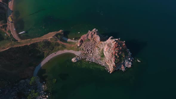 Aerial Drone Footage. Summer. Lake Baikal. Olkhon Island. Rocks in the Siberia. Cape Burkhan