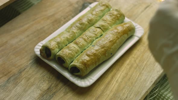 Arrange on a Rectangular Plate the Cake Made of Cherries with Green and Red Dough