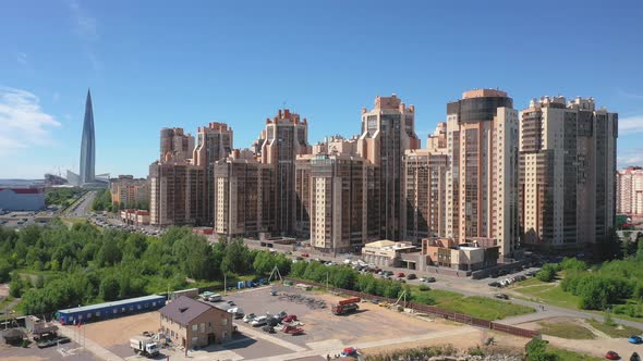 Aerial Drone Pull-Out shot of a residential building compound next to the Western High-Speed Diamete