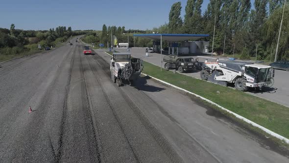 Road construction site near a gas station