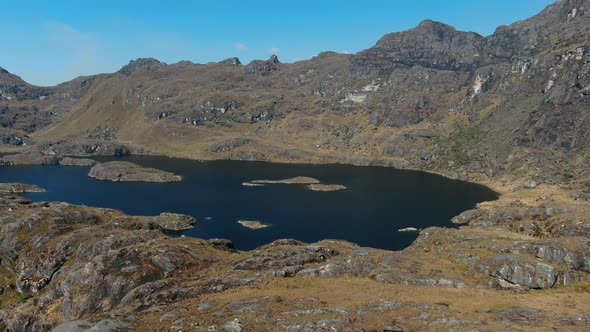 4k aerial drone footage over the 4th lagoon of Pichgacocha from Ambo, Huanuco, Peru in the Andes mou