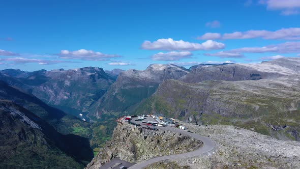 Flying over a Viewpoint with nice view of geiranger fjord and mountain peaks