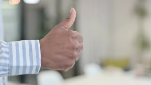 Close Up of African Man Showing Thumbs Up Gesture