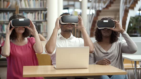 Front View of Three Users with VR Headsets