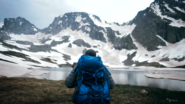 Man Climber Goes to the Beautiful Mountain