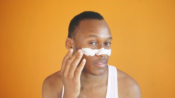 Closeup African American White Guy Uses Nourishing Mask Face Homemade Skin Care