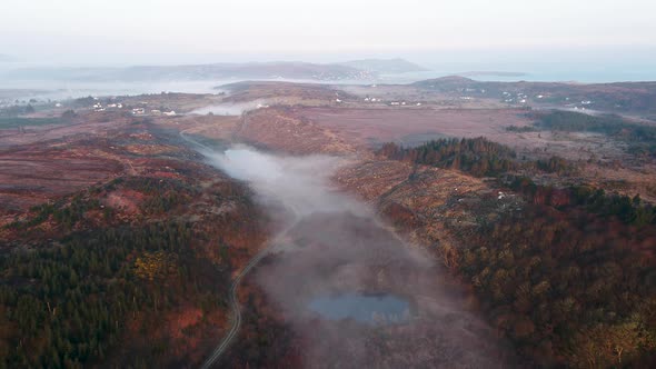 Aerial View of Bonny Glen in County Donegal with Fog  Ireland