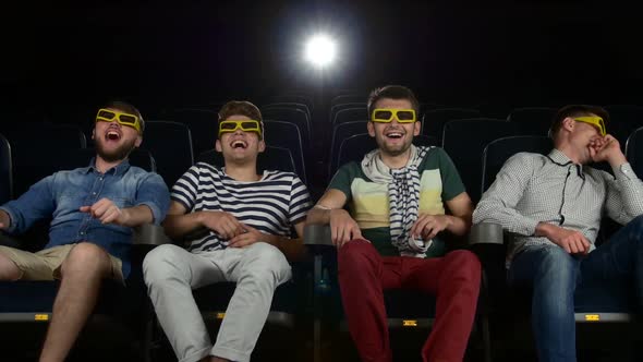 Company of the Men Watching a Movie at Cinema