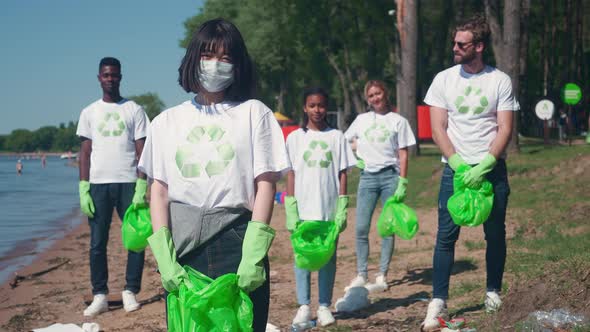 Eco Activists and Volunteers are Fighting for the Preservation of Nature Volunteers are Standing and