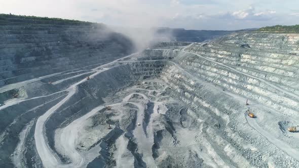 Aerial view of explosion smoke in Huge asbestos quarry 15