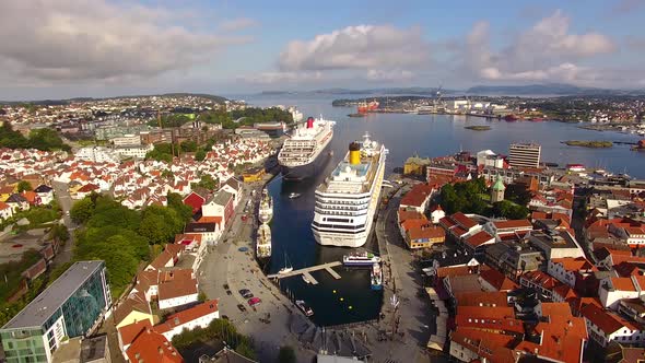 Cruise ships are moored in a harbor of Stavanger in summer, aerial view