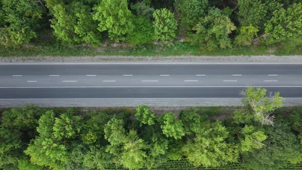 Top View of the Highway on Which Cars and Trucks Drive