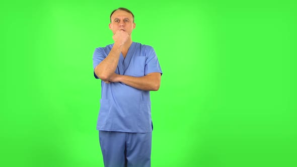 Medical Man Thinks About Something. Green Screen