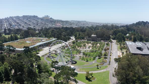 Aerial wide pullback shot of the Music Concourse plaza in Golden Gate Park, San Francisco. 4K