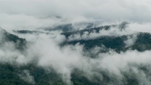 220521_Time lapse of fluffy mist and cloud moving smoothly on a rainy day.