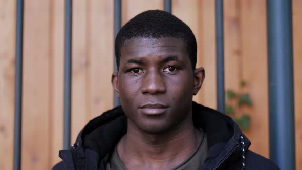 Confident serious attractive young african black man looking at camera