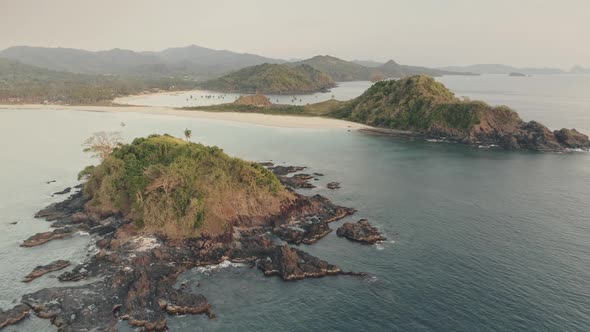 Slow Motion Aerial View of Green Cliff Islands