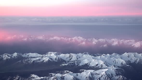 Colorful Clouds Over The Mountain Range