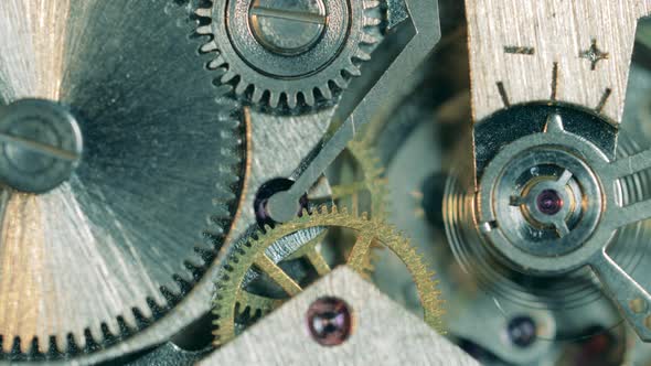 Spinning Elements of a Clockwork Mechanism