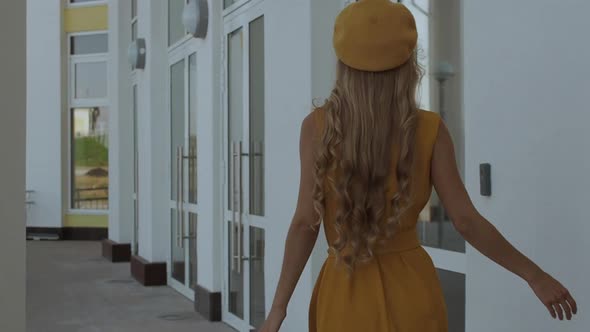 Confident Stylish Woman Walking on Street