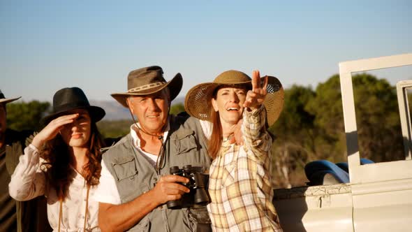 Happy friends enjoying during safari vacation 4k