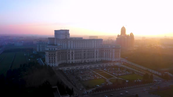 Sunset Drone Shot Of The Palace Of The Parliament in Bucharest, Romania