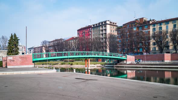 Navigli (Darsena) of Milan with people walking, timelapse, 4k