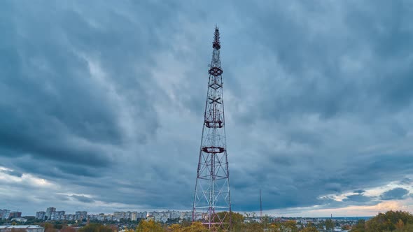 Epic Cloudscape Timelapse. Autumn Cityscape with Dramatic Clouds, Skyscrapers and Radio Tower