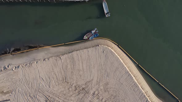 Aerial view reclamation land near the wooden bridge