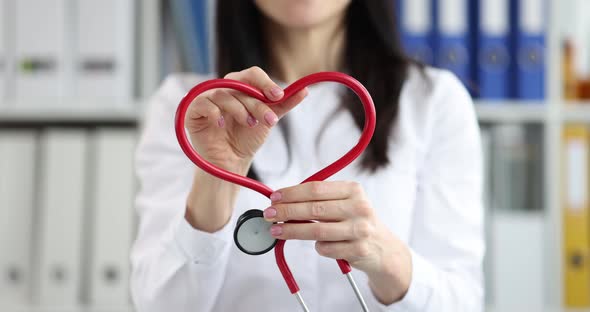 Doctor Makes Heart Sign From Stethoscope Closeup