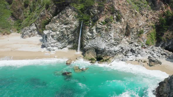 Beautiful Waterfall in Green Forest Aerial View  Clear Green Blue Lagoon